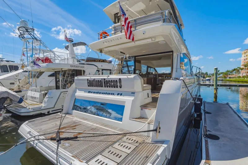 Slide: The Image of Luxury 2022 Prestige 520 yacht docked at marina, Bradenton, Florida. - 11