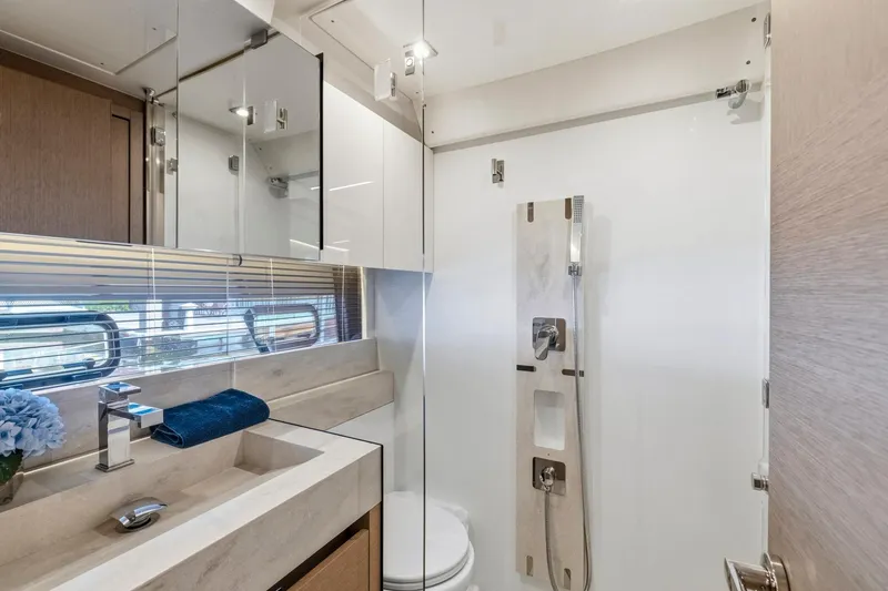 Slide: The Image of Luxurious bathroom interior of 2022 Prestige 520 yacht with modern fixtures and elegant design. - 18