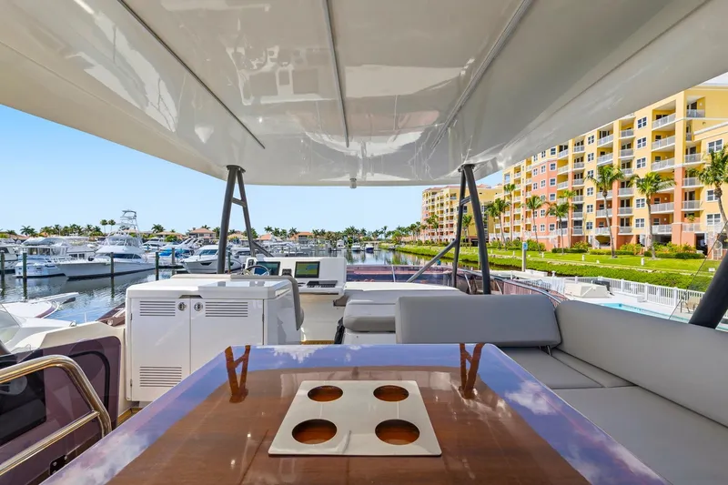 Slide: The Image of Luxurious 2022 Prestige 520 yacht interior with marina and waterfront view. - 32