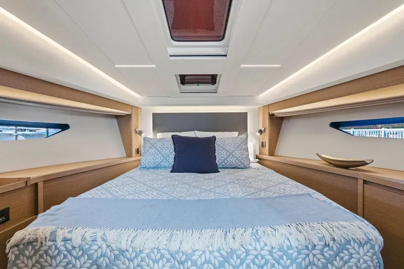 Slide: The Image of Luxurious cabin interior of 2022 Prestige 520 yacht with elegant bedding and modern design. - 35