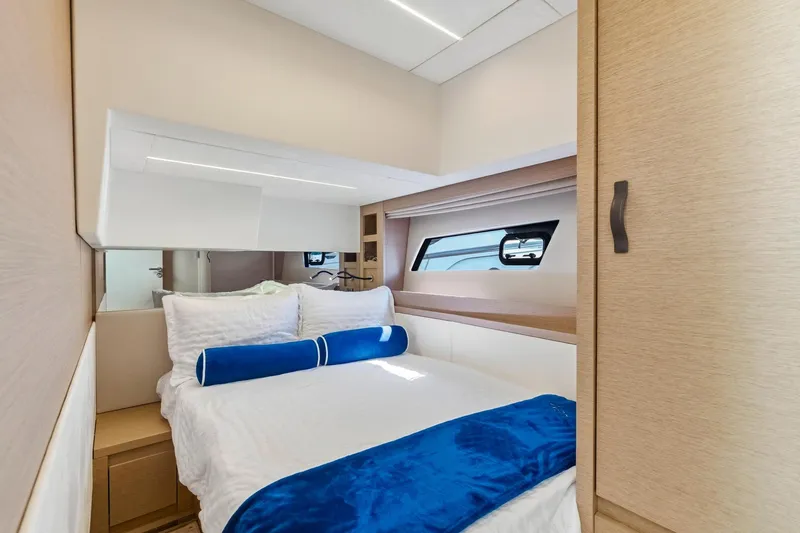 Slide: The Image of Luxurious cabin interior of 2022 Prestige 520 yacht with elegant bedding and modern design. - 38