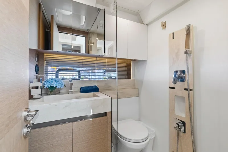 Slide: The Image of Luxurious bathroom in 2022 Prestige 520 yacht with modern fixtures and elegant design. - 39