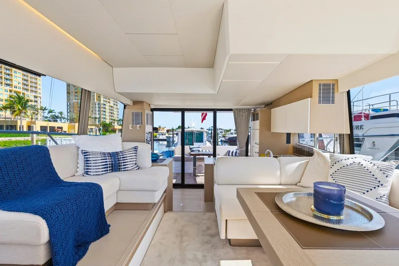 Slide: The Image of Luxurious interior of a 2022 Prestige 520 yacht with elegant seating and decor. - 44