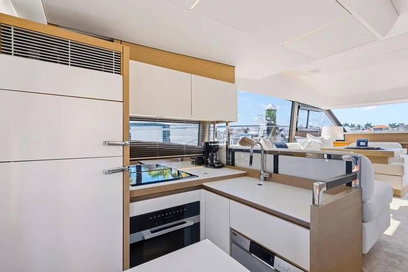 Slide: The Image of Modern kitchen interior on 2022 Prestige 520 yacht, featuring sleek design and ocean views. - 47