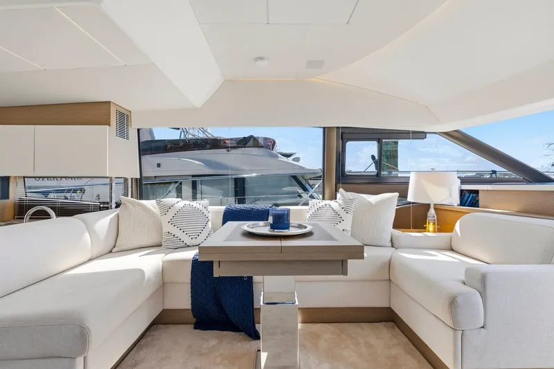 Slide: The Image of Luxurious interior of 2022 Prestige 520 yacht with elegant seating and modern decor. - 54