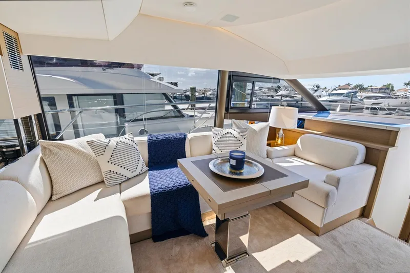 Slide: The Image of Luxurious interior of 2022 Prestige 520 yacht with elegant seating and modern decor. - 55