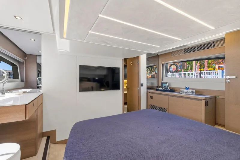 Slide: The Image of Luxurious interior of 2022 Prestige 520 yacht with modern furnishings and large windows. - 61