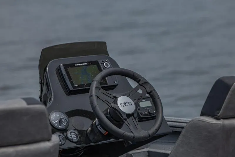 Slide: The Image of Steering console of Excel EX 203 boat, featuring modern navigation equipment, 2026 model. - 5