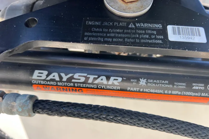 Slide: The Image of BayStar outboard motor steering cylinder on 2017 Boston Whaler 170 Montauk boat. - 14