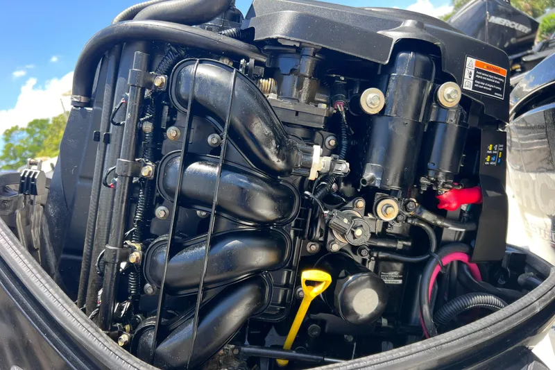 Slide: The Image of Close-up of a 2017 Boston Whaler 170 Montauk boat engine components. - 29