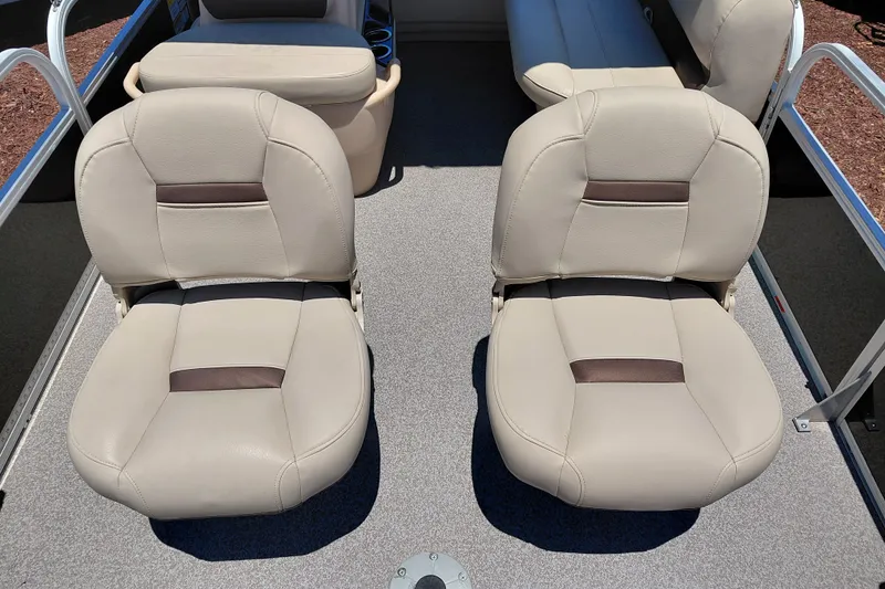 Slide: The Image of 2019 Sun Tracker Bass Buggy 16 DLX boat interior with beige seating. - 12