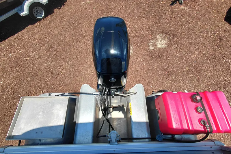Slide: The Image of Top view of a 2019 Sun Tracker Bass Buggy 16 DLX boat engine and fuel tank. - 29