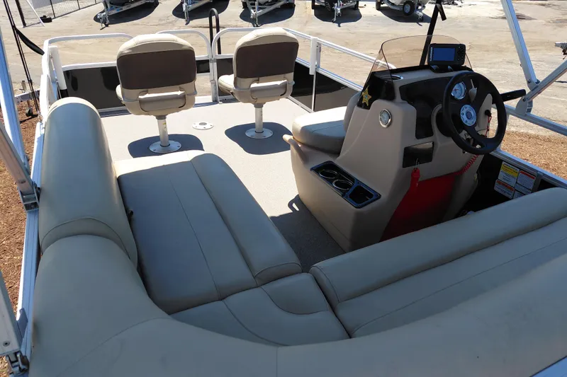 Slide: The Image of 2019 Sun Tracker Bass Buggy 16 DLX interior with seating and steering console. - 33