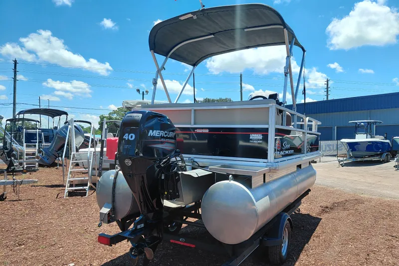Slide: The Image of 2019 Sun Tracker Bass Buggy 16 DLX pontoon boat with Mercury 40 HP engine, outdoor display. - 7