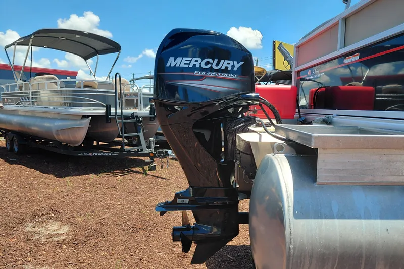 Slide: The Image of 2019 Sun Tracker Bass Buggy 16 DLX pontoon boat with Mercury outboard motor. - 9
