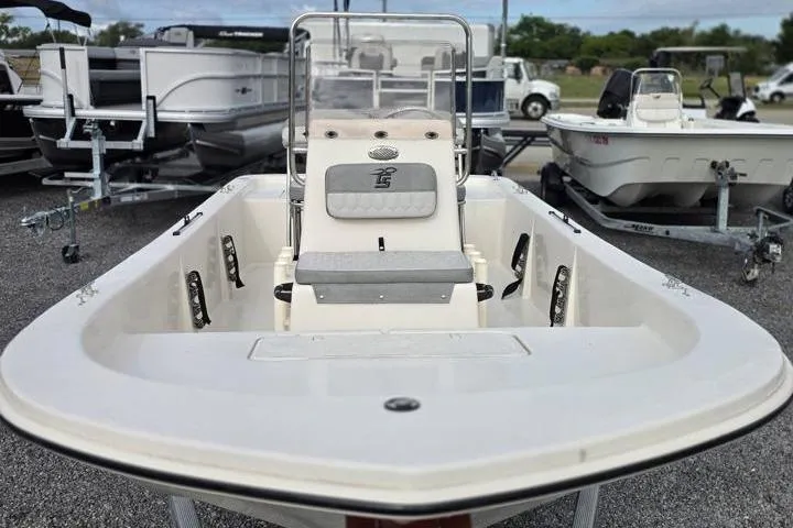 Slide: The Image of 2025 Carolina Skiff E18 JVX CC boat on display, featuring a sleek center console design. - 11