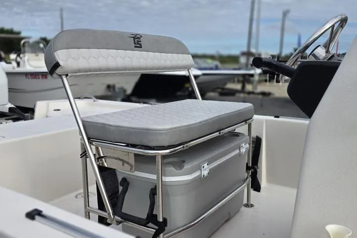 Slide: The Image of 2025 Carolina Skiff E18 JVX CC boat seat with integrated cooler, showcasing modern design. - 14