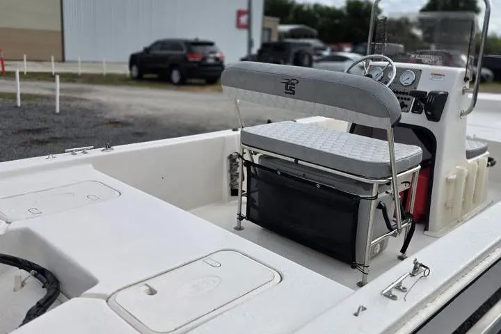Slide: The Image of 2025 Carolina Skiff E18 JVX CC boat interior with seating and console. - 17