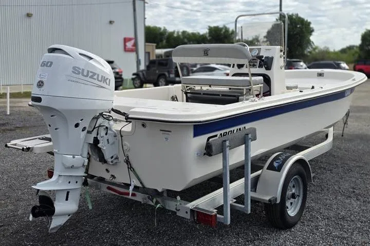 Slide: The Image of 2025 Carolina Skiff E18 JVX CC boat on trailer with Suzuki 60 outboard motor. - 8