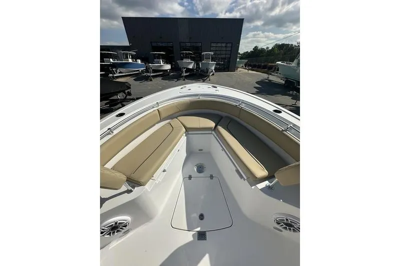 Slide: The Image of 2026 Sportsman Heritage 231 Center Console boat with spacious seating and modern design. - 20