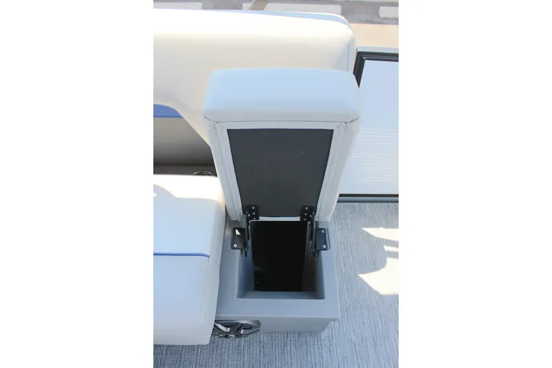 Slide: The Image of Open storage compartment in 2026 Qwest Lanai 816 boat, featuring sleek design and functionality. - 11