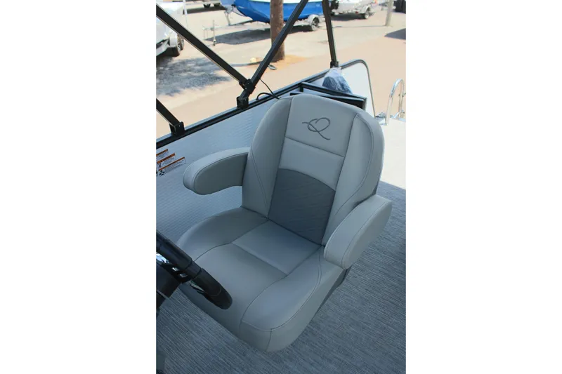 Slide: The Image of Gray captain's chair on 2026 Qwest Lanai 816 boat, featuring sleek design and logo embroidery. - 14