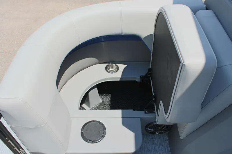 Slide: The Image of Luxurious seating area on 2026 Qwest Lanai 816 boat with storage and cup holder. - 18