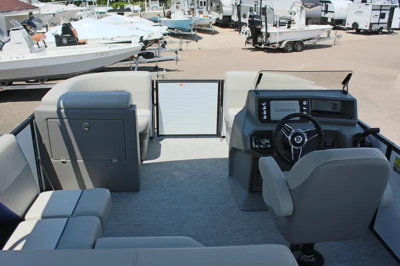 Slide: The Image of Interior view of 2026 Qwest Lanai 816 pontoon boat with modern helm and seating. - 20