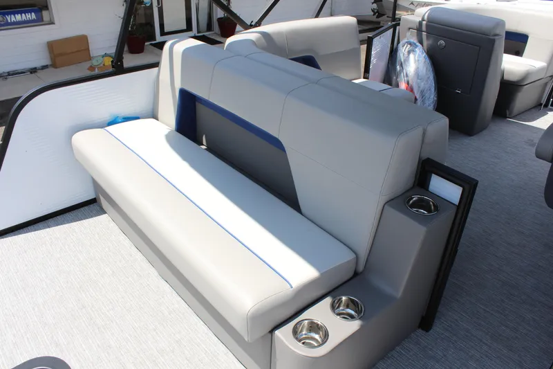 Slide: The Image of Luxurious seating on 2026 Qwest Lanai 816 boat with cup holders and modern design. - 7