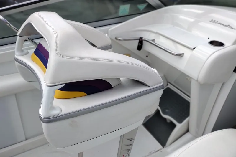 Slide: The Image of 2006 Formula 353 FASTech boat interior with white and colorful seating. - 14