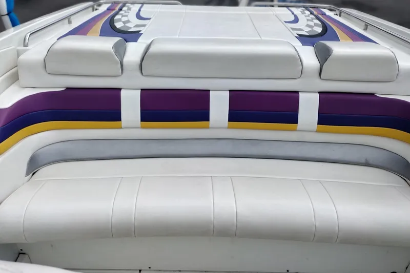 Slide: The Image of 2006 Formula 353 FASTech boat interior with colorful striped upholstery. - 15