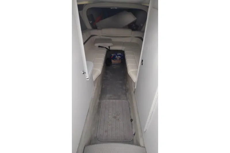 Slide: The Image of Interior cabin of a 2006 Formula 353 FASTech boat with white seating. - 18