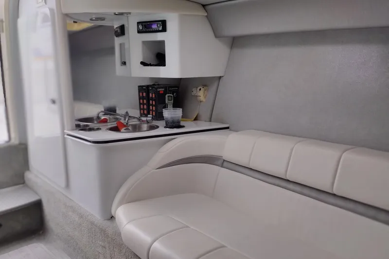 Slide: The Image of Interior of 2006 Formula 353 FASTech boat with kitchenette and seating area. - 19
