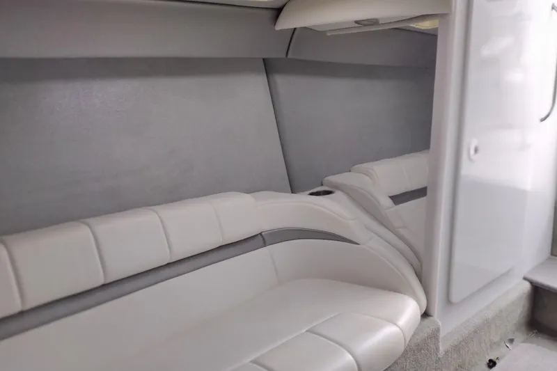 Slide: The Image of Interior of a 2006 Formula 353 FASTech boat, featuring sleek white seating. - 20