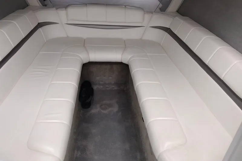 Slide: The Image of Interior of a 2006 Formula 353 FASTech boat with white leather seating. - 25