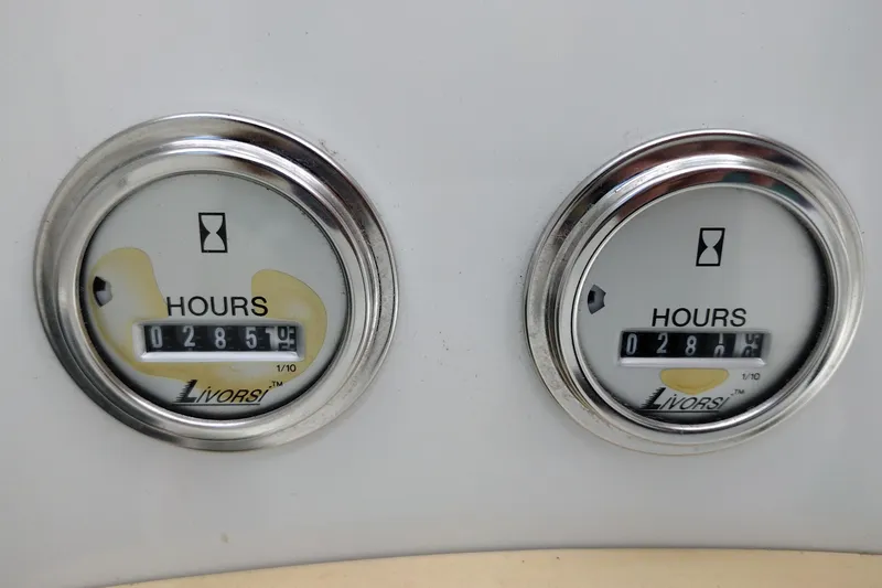 Slide: The Image of 2006 Formula 353 FASTech hour meters displaying 285.2 and 281.6 hours. - 27