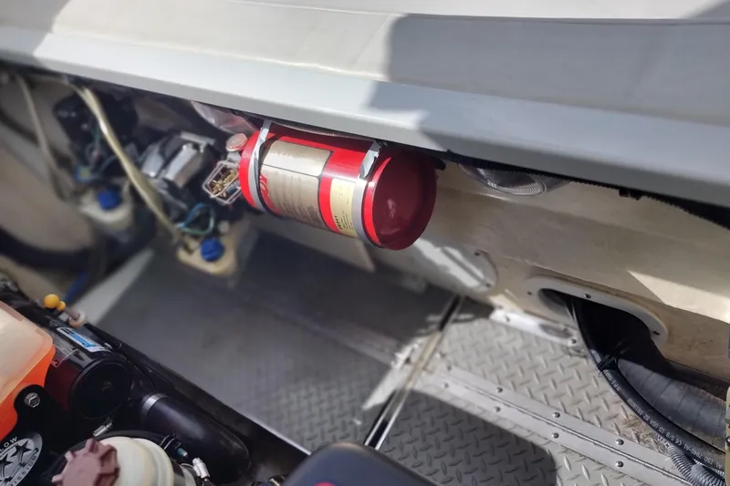 Slide: The Image of Engine compartment of a 2006 Formula 353 FASTech boat with fire extinguisher. - 34