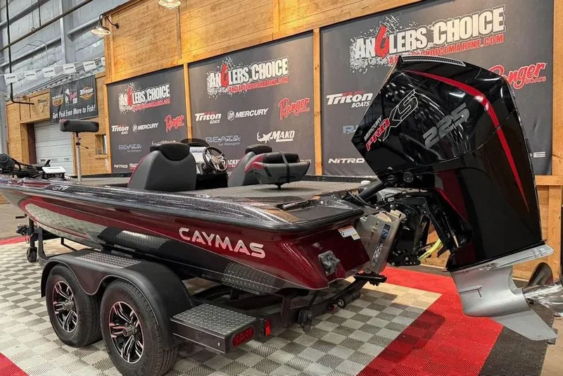 Slide: The Image of 2022 Caymas CX 19 boat with Mercury Pro XS 225 engine on display. - 6