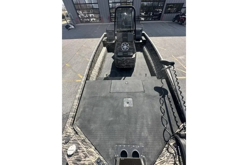 Slide: The Image of 2023 Havoc 1756 MRST boat interior with camo design and modern console. - 15