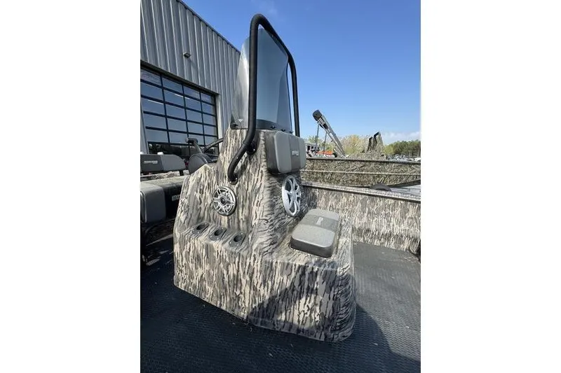 Slide: The Image of 2023 Havoc 1756 MRST boat console with camouflage design and modern features. - 16