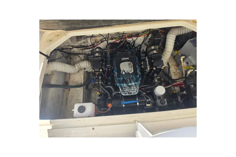 Slide: The Image of Engine compartment of a 2000 Bayliner 2855 Ciera boat, showcasing detailed components. - 30