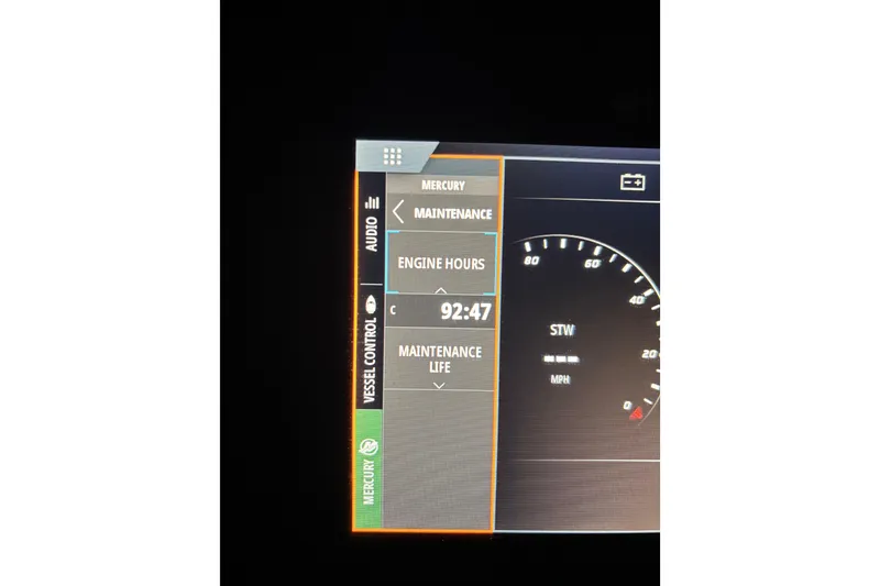 Slide: The Image of Dashboard display of 2023 Chaparral 270 OSX showing 92:47 engine hours. - 29