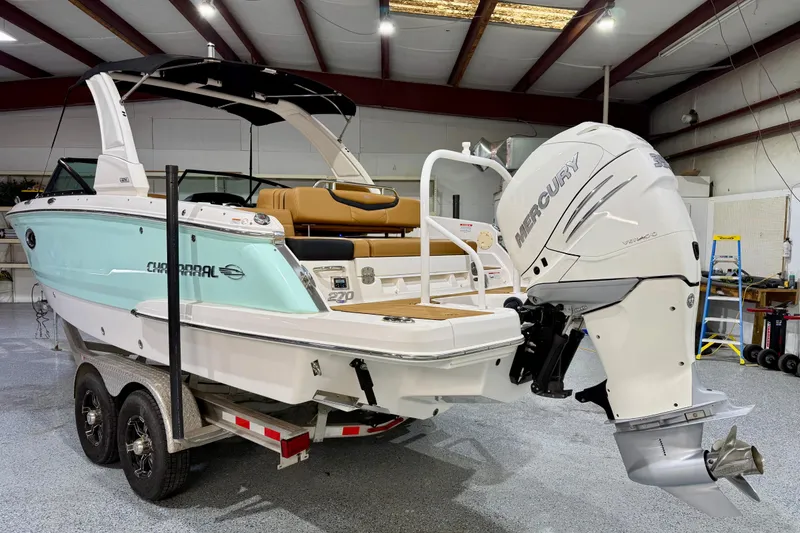 Slide: The Image of 2023 Chaparral 270 OSX boat with Mercury engine in a showroom. - 4