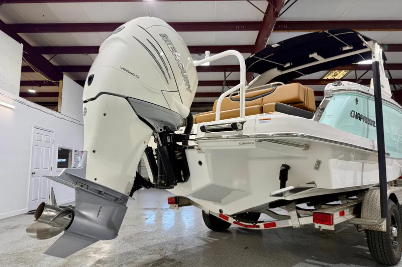 Slide: The Image of 2023 Chaparral 270 OSX boat with Mercury Verado engine in a showroom. - 6