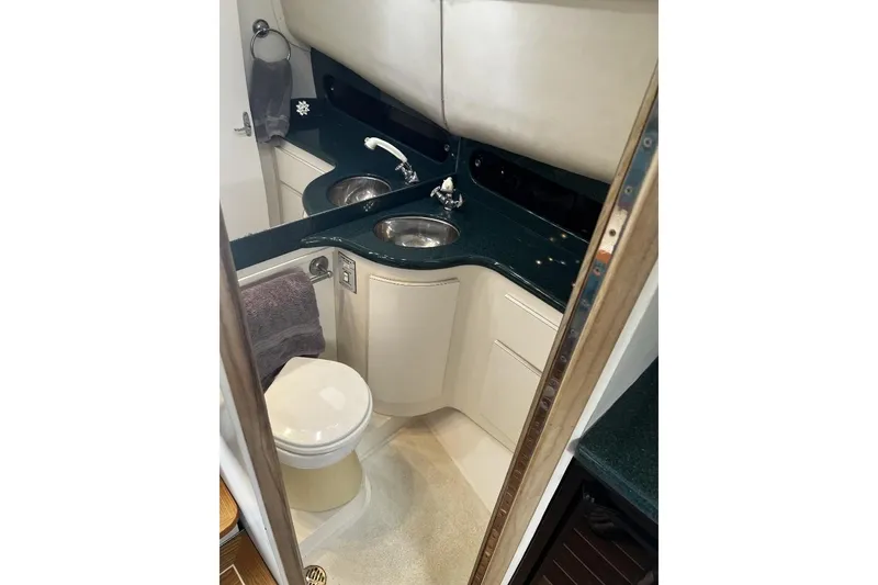 Slide: The Image of Luxurious bathroom in 1993 Blackfin 31 Combi boat with modern fixtures and elegant design. - 8