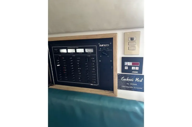 Slide: The Image of Control panel of 1993 Blackfin 31 Combi boat, labeled "Cuckoo's Nest." - 9