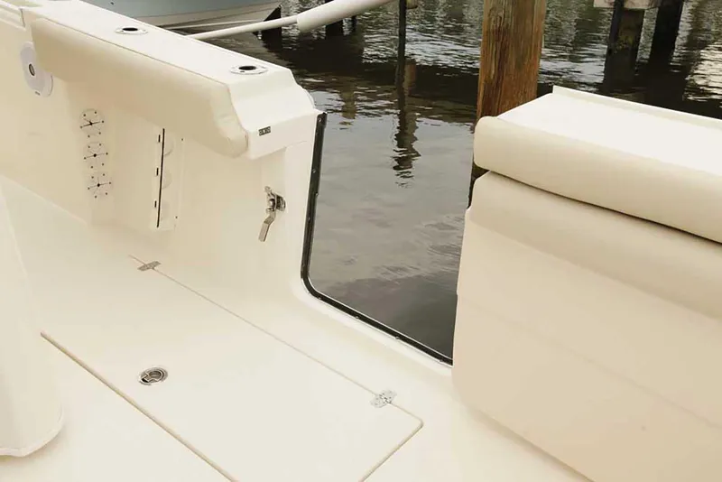 Slide: The Image of Manufacturer Provided Image: 2020 Cobia 350 Center Console boat interior with open transom door. - 16