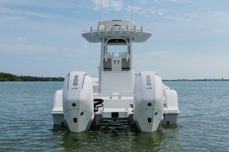 Slide: The Image of Freeman 28 boat with dual 300 V8 engines on calm water, 2023 model. - 4