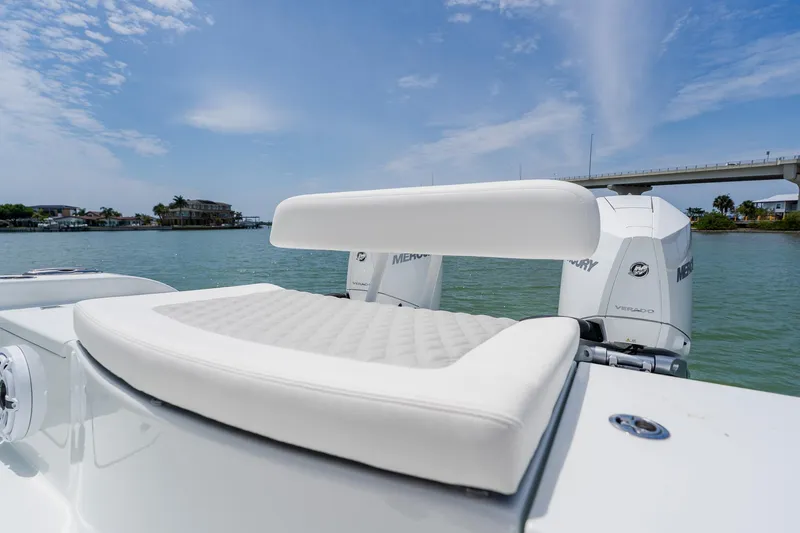 Slide: The Image of 2023 Freeman 28 boat with white seating and Mercury engines on a sunny day. - 42