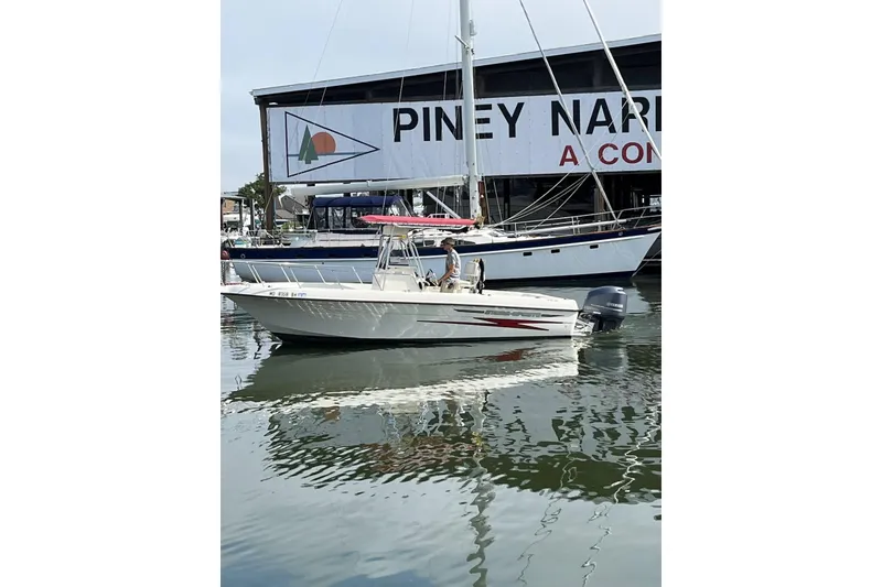 Slide: The Image of 1999 Hydra-Sports 230 CC boat docked at Piney Narrows Marina. - 1